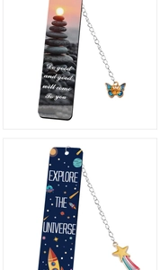 Detail of stainless steel bookmarks with Zen sunset and space explorer engraving
