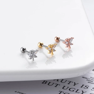 Three crystal butterfly cartilage earrings in silver, gold, and rose gold finishes