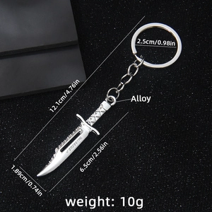 Polished silver metal karambit knife keychain model with detailed size measurements
