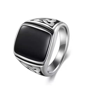 Vintage silver steel wolf seal ring for men featuring black stone and Celtic knot patterns