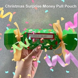 Detail of candy-shaped Christmas money pull gift box with festive Santa Claus graphics