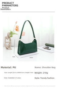 Detail showing emerald green crocodile pattern PU leather bag dimensions 22x6x14cm
