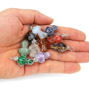 Handmade wire wrapped crystal mushroom pendants in various natural stones for necklaces