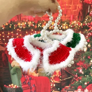 Knitted Christmas pet shawl in red and green with faux pearl accent for dogs and cats