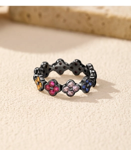 Detailed shot of S925 sterling silver black clover ring with vibrant colorful gemstones