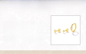 Detailed view of sterling silver moon, cross earrings and zirconia hoop set