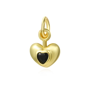 Detail of gold-plated 18k heart pendant with black zircon stone for jewelry making