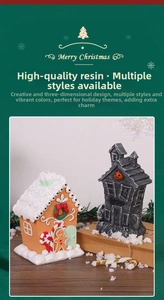 Detail of Christmas gingerbread house and Halloween ghost house resin ornaments