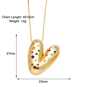 Detail view of gold letter V heart pendant with colorful zircon stones and dimensions