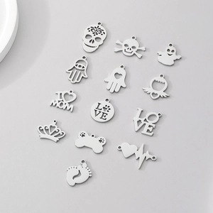 Detailed collection of silver stainless steel DIY pendants with skull and heart shapes