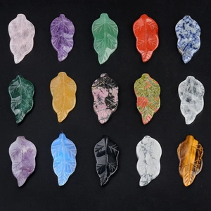 Set of 15 natural crystal leaf pendants including rose quartz and amethyst stones
