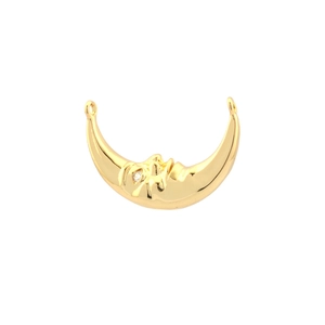 Macro view of 18K gold plated crescent moon face pendant with sparkling zircon gem