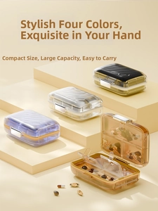 Macro detail of portable mini pill box with four compartments in modern pastel colors
