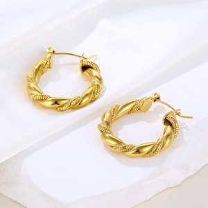 Golden twisted rope hoop earrings in a minimalist geometric style for women