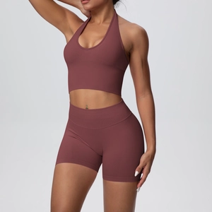 Macro detail of the ribbed knit texture and seamless fabric on the brown yoga set