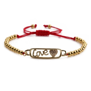 Bracciale regolabile con perline placcate in oro e cordino rosso con cuore in zircone