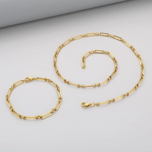 Parure collier et bracelet en acier titane doré avec chaîne trombone élégante
