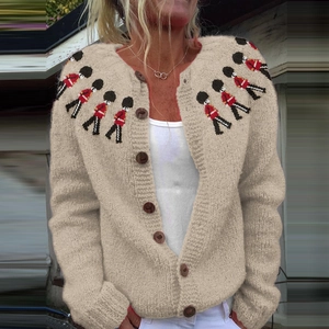 Detail of beige cardigan with British Royal Guard embroidery and wooden buttons