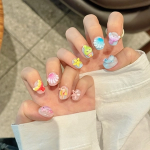 3D cartoon marine animal handmade press-on nails featuring seahorse and starfish designs