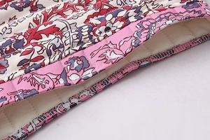 Close-up of quilted floral pattern and stitching on a street fashion vest jacket