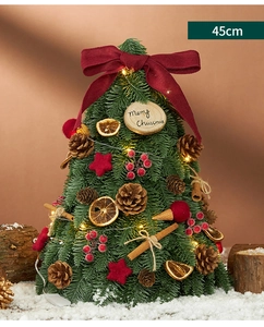 Dettaglio mini albero di Natale 45cm con fiocchi rossi, pigne e luci LED calde