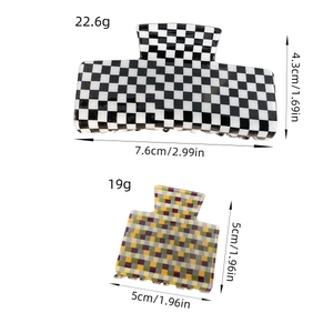 Square checkered acrylic hair claw clips in black, white, and multicolored patterns