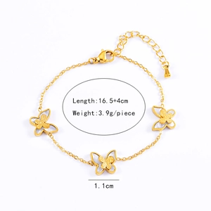 Detailed view of a golden butterfly bracelet with O-chain and adjustable length extension