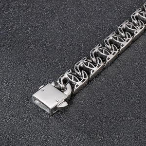 Macro view of vintage stainless steel chain link bracelet with interlocking C-shaped links