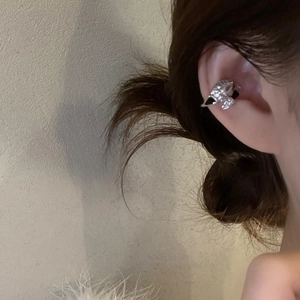Silver Kuromi style snake serpent ear cuff with zircon crystals shown on model