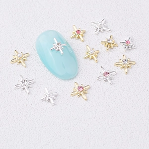 Star-shaped alloy nail charms with pink zircons and pearls in gold and silver finish