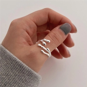 Minimalist 925 sterling silver irregular branch ring with adjustable open design on thumb