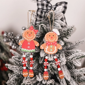Christmas gingerbread man wooden tree ornaments with red beads and checkered bows