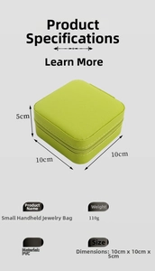 Detailed view of green portable jewelry box showing 10x10x5cm dimensions and PVC texture