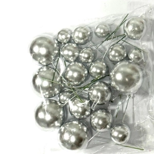 Mixed sizes of silver decorative cake balls with metal wires in transparent packaging