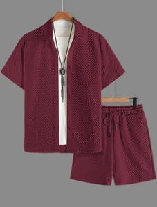 Close-up of burgundy waffle knit texture on men's short sleeve shirt and shorts set