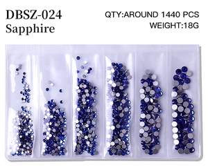 Detailed view of sapphire flatback nail rhinestones in a 6-compartment organizer box
