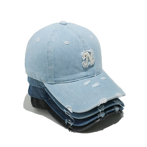 Vintage washed denim baseball caps with distressed N patch in light blue, dark blue and black