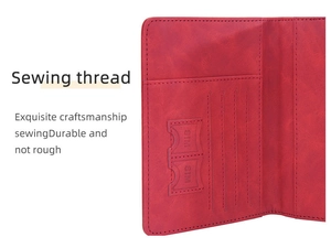 Detail of red leather passport wallet showing precision sewing thread and dedicated SIM card slots