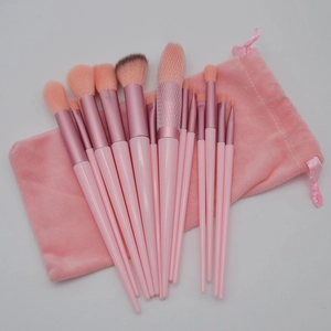 Set of 13 professional pink makeup brushes with matching velvet storage pouch