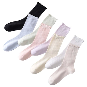 Eight pairs of silk lace socks in pastel colors shown in a neat flat lay arrangement