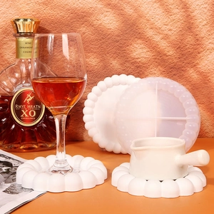 Detailed view of bubble scallop coaster silicone mold with finished matte white product