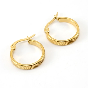 Classic golden stainless steel hoop earrings with elegant diagonal textured engraving