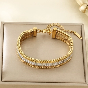 Detail of 18K gold plated double-row chain bracelet with rectangular zircon crystals