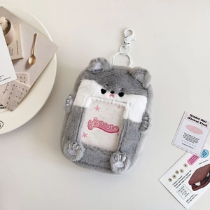 Detail of plush animal photo card holder with cute husky design and hanging hook