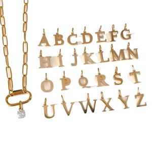 Gold stainless steel necklace with a CZ charm and a complete set of A-Z alphabet pendants