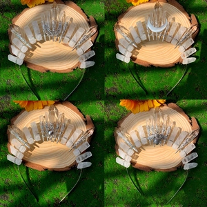 Detailed macro view of handmade quartz crystal headbands with celestial moon and bee charms