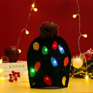 Close-up of black knitted Christmas hat featuring glowing LED lights and ON/OFF switch
