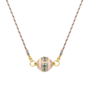 Detail of colorful ball pendant with pink and blue enamel and gold-plated hardware