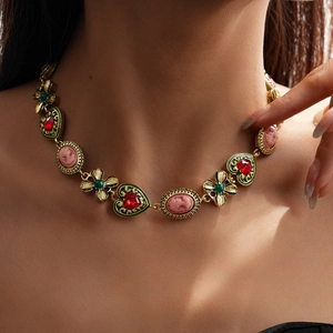 Vintage palace style gold necklace with pink cameo and colorful heart gemstones