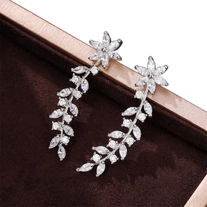 Sparkling floral drop earrings with marquise-cut crystals in a silver-tone setting